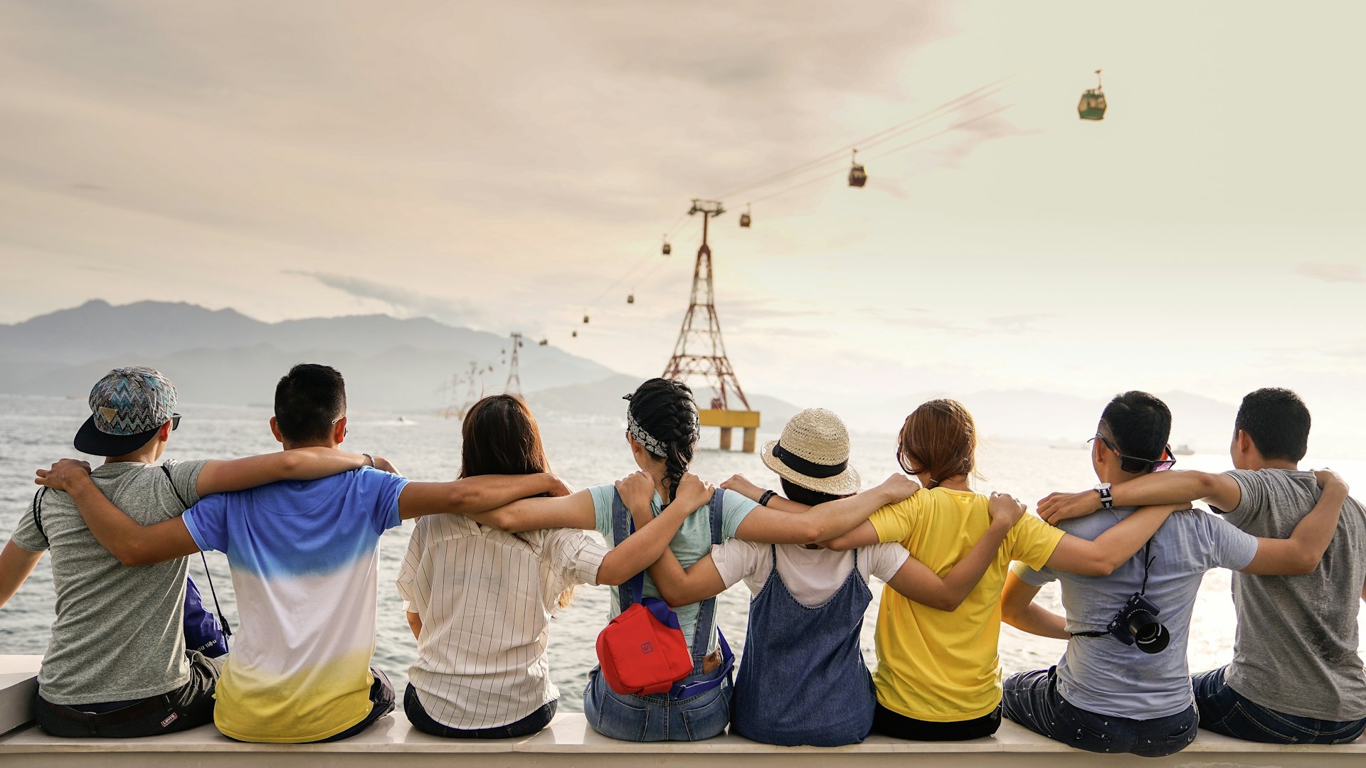 A group of friends looking out over the sea